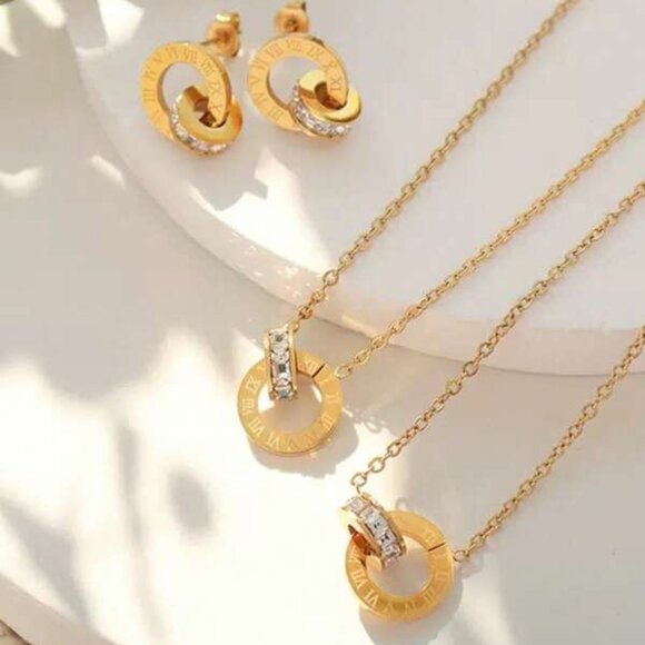 Roman numeral-engraved circles complemented by sparkling cubic zirconia - Picture 3 of 5